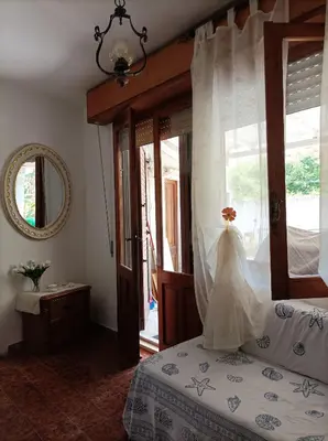 Letto o letti in una camera di Appartamento Oliver Villasimius