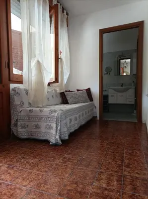 Letto o letti in una camera di Appartamento Oliver Villasimius