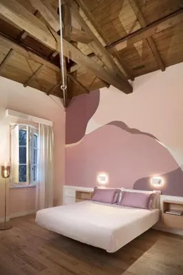 Letto o letti in una camera di Casa Clàt - Boutique Hotel