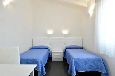 Letto o letti in una camera di Sa Omu Bianca