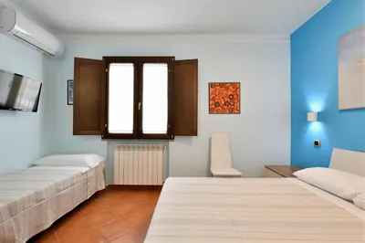 Letto o letti in una camera di Sa Omu Bianca