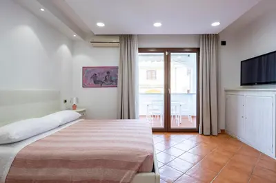 Letto o letti in una camera di Sa Omu Bianca
