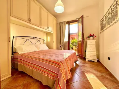Letto o letti in una camera di La Casetta