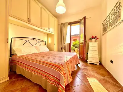 Letto o letti in una camera di La Casetta