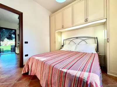 Letto o letti in una camera di La Casetta