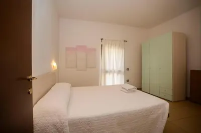 Letto o letti in una camera di Residence Stella Dell'Est