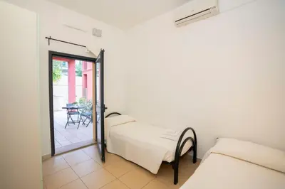 Letto o letti in una camera di Residence Stella Dell'Est