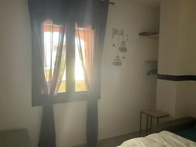 Letto o letti in una camera di Appartement calme, vue panoramique à 100 m du centre ville