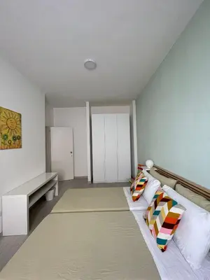 Letto o letti in una camera di SoleLuna b&b