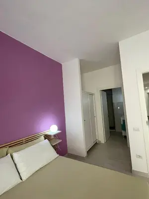 Letto o letti in una camera di SoleLuna b&b