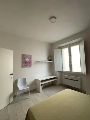 Letto o letti in una camera di SoleLuna b&b