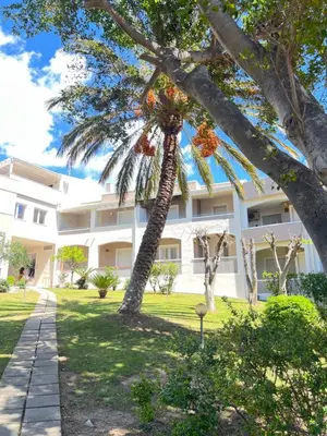 Giardino di Moderno appartamento dí Beniamino Murgioni a Villasimius
