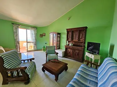 TV o dispositivi per l'intrattenimento presso Casa con magnifica vista mare