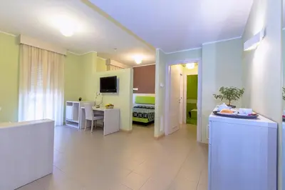 TV o dispositivi per l'intrattenimento presso Hotel Residence Ulivi E Palme