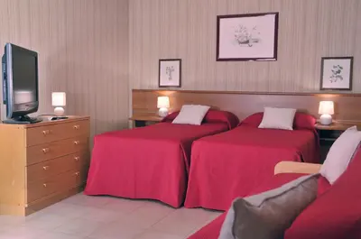 TV o dispositivi per l'intrattenimento presso Hotel Residence Ulivi E Palme