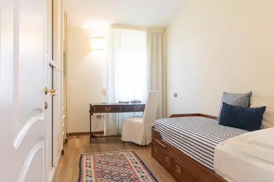 Letto o letti in una camera di Villa Caterina