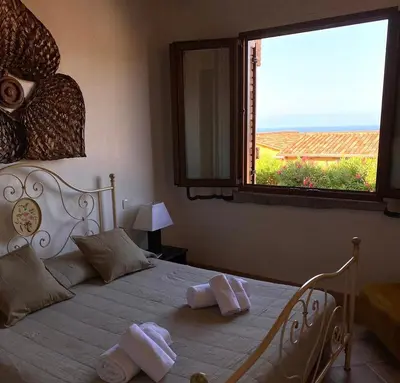 Letto o letti in una camera di Casa Girasole