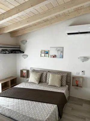 Letto o letti in una camera di Casa vacanze residenza del sole