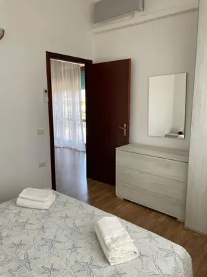 Letto o letti in una camera di Casa Azzurra