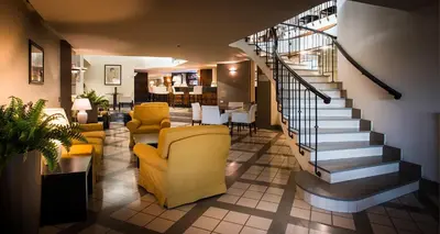 Area soggiorno di Sardegna Hotel - Suites & Restaurant