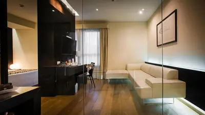 Area soggiorno di Sardegna Hotel - Suites & Restaurant
