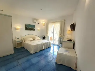 Letto o letti in una camera di Janas Hotel