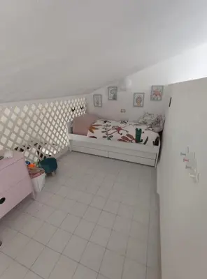 Letto o letti in una camera di Emerald Cottage Calaverde Santa Margherita di Pula