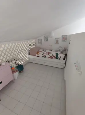 Letto o letti in una camera di Emerald Cottage Calaverde Santa Margherita di Pula