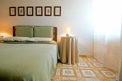 Letto o letti in una camera di Mimì Rooms