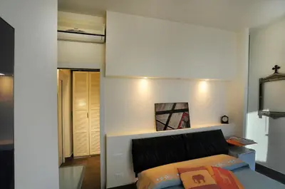 Letto o letti in una camera di Art House Quartu - Margine Rosso