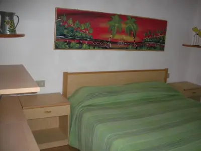 Letto o letti in una camera di Casa Michela