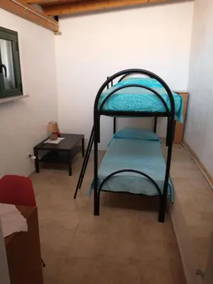 Letto o letti in una camera di Da Carla