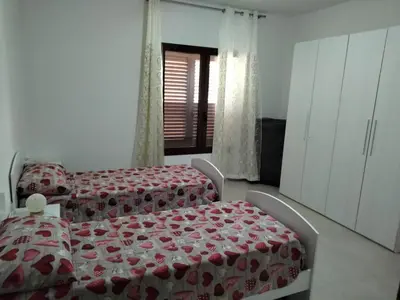 Letto o letti in una camera di SGM CASA VACANZE