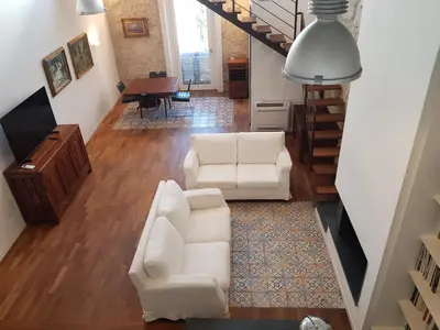 Area soggiorno di Casa di Mario appartamento in centro storico con due camere da letto e terrazze