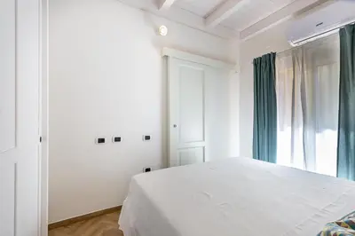 Letto o letti in una camera di Casa Titina