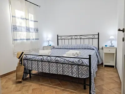 Letto o letti in una camera di Appartamento La Ginestra - Affitti Brevi Italia