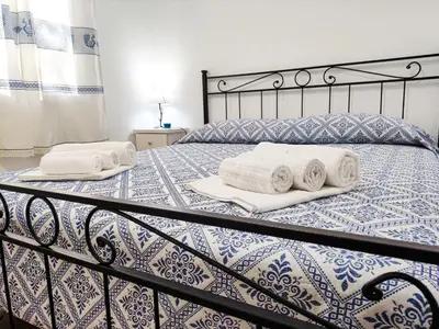 Letto o letti in una camera di Appartamento La Ginestra - Affitti Brevi Italia