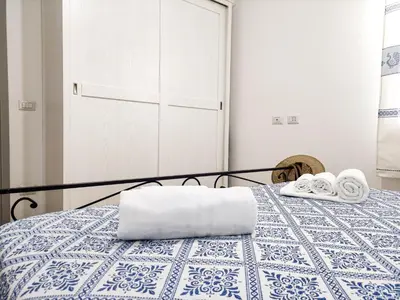 Letto o letti in una camera di Appartamento La Ginestra - Affitti Brevi Italia