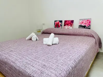 Letto o letti in una camera di B&B S'arciaredda
