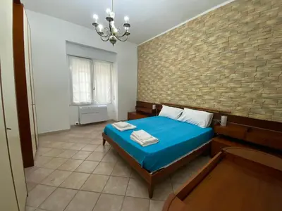 Letto o letti in una camera di Rossini's house