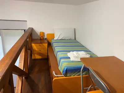 Letto o letti in una camera di Rossini's house