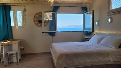 Letto o letti in una camera di Villa Rosa