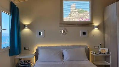 Letto o letti in una camera di Villa Rosa