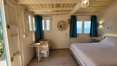 Letto o letti in una camera di Villa Rosa