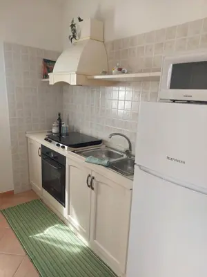 Cucina o angolo cottura di Venus Apartment Villasimius