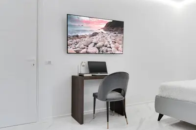 TV o dispositivi per l'intrattenimento presso The Crown Black and White rooms