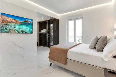 Letto o letti in una camera di Caralis Suites Rooms