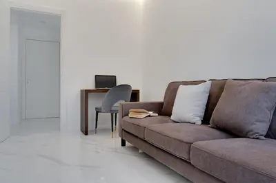 Area soggiorno di Caralis Suites Rooms