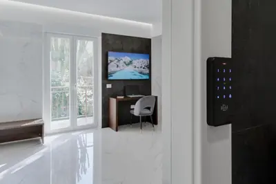 TV o dispositivi per l'intrattenimento presso Caralis Suites Rooms