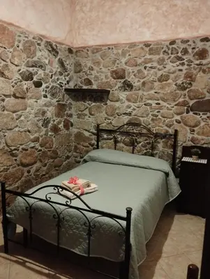Letto o letti in una camera di Casa vacanza da Rosy